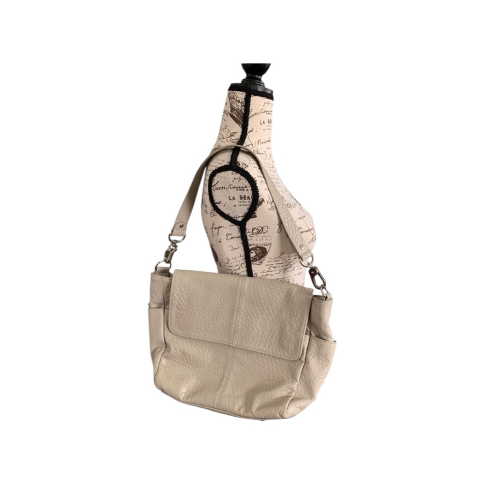 Taupe pebble textured purse.